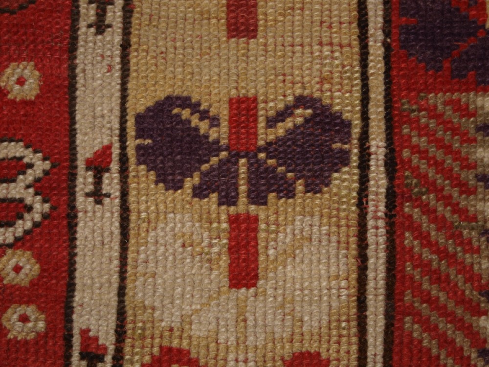 ANTIQUE TURKISH MILAS VILLAGE RUG OF SCARCE DESIGN, CIRCA 1850. View XIV