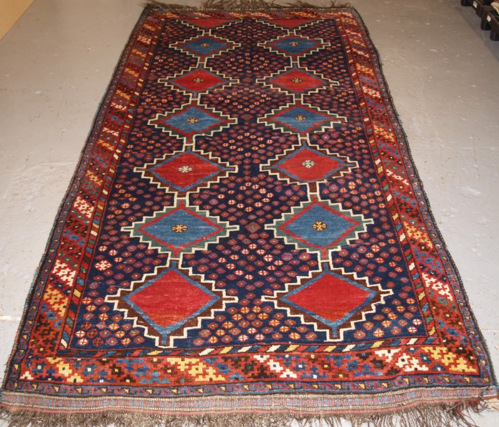 ANTIQUE LURI TRIBAL LONG RUG, BOLD DESIGN AND COLOUR, CIRCA 1900/20.