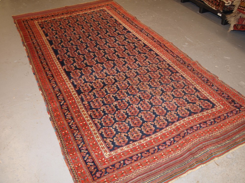 ANTIQUE LONG RUG BY THE AFSHAR TRIBE, BOTEH DESIGN, CIRCA 1890. View II
