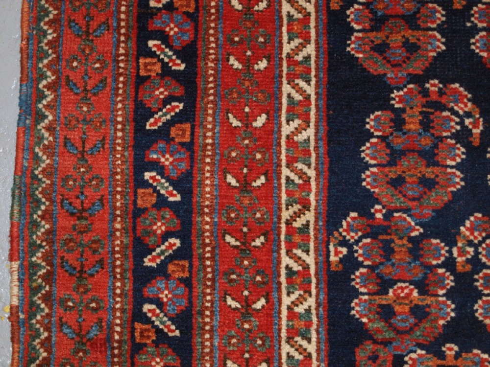 ANTIQUE LONG RUG BY THE AFSHAR TRIBE, BOTEH DESIGN, CIRCA 1890. View IV