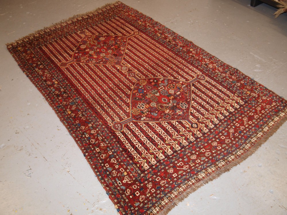 ANTIQUE TRIBAL KHAMSEH RUG WITH CANE DESIGN, CIRCA 1880. View II