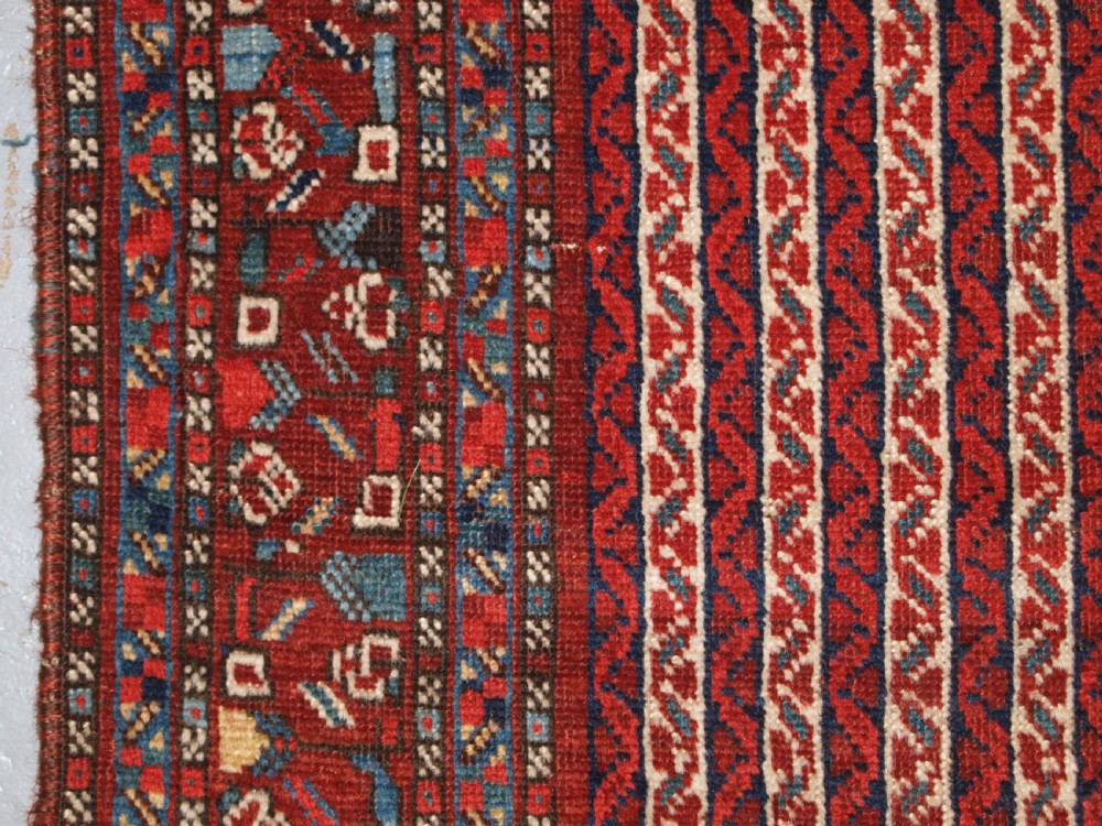 ANTIQUE TRIBAL KHAMSEH RUG WITH CANE DESIGN, CIRCA 1880. View IV