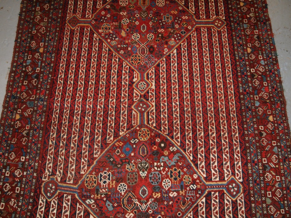 ANTIQUE TRIBAL KHAMSEH RUG WITH CANE DESIGN, CIRCA 1880. View VI