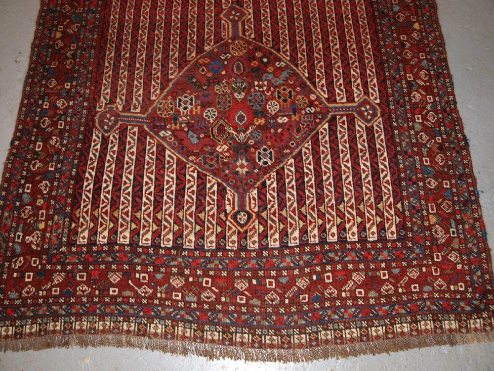 ANTIQUE TRIBAL KHAMSEH RUG WITH CANE DESIGN, CIRCA 1880. View VII