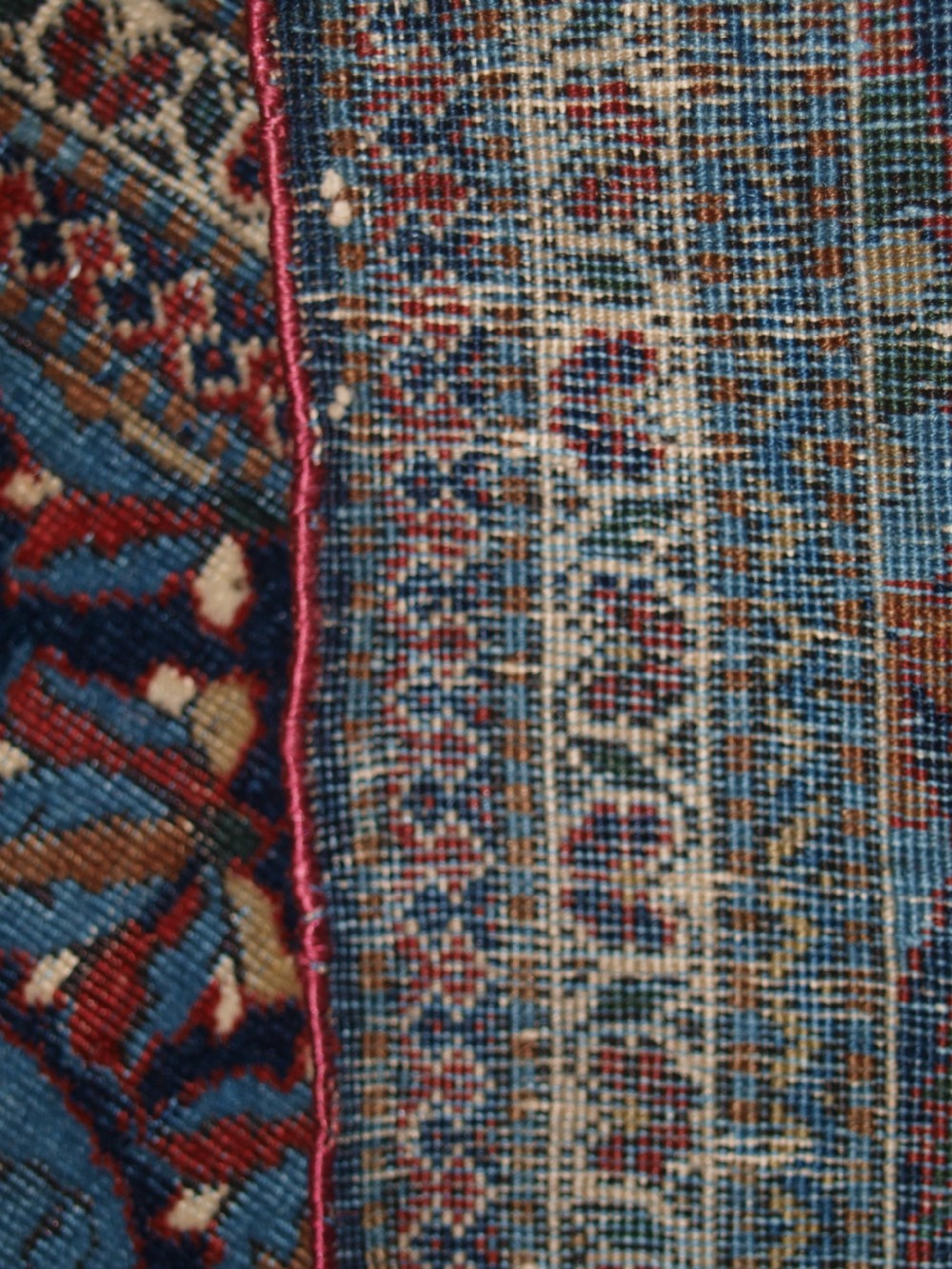 A hand-knotted Persian Kork Kashan wool rug featuring a central medallion with intricate floral motifs in navy blue, red, and cream. View XI