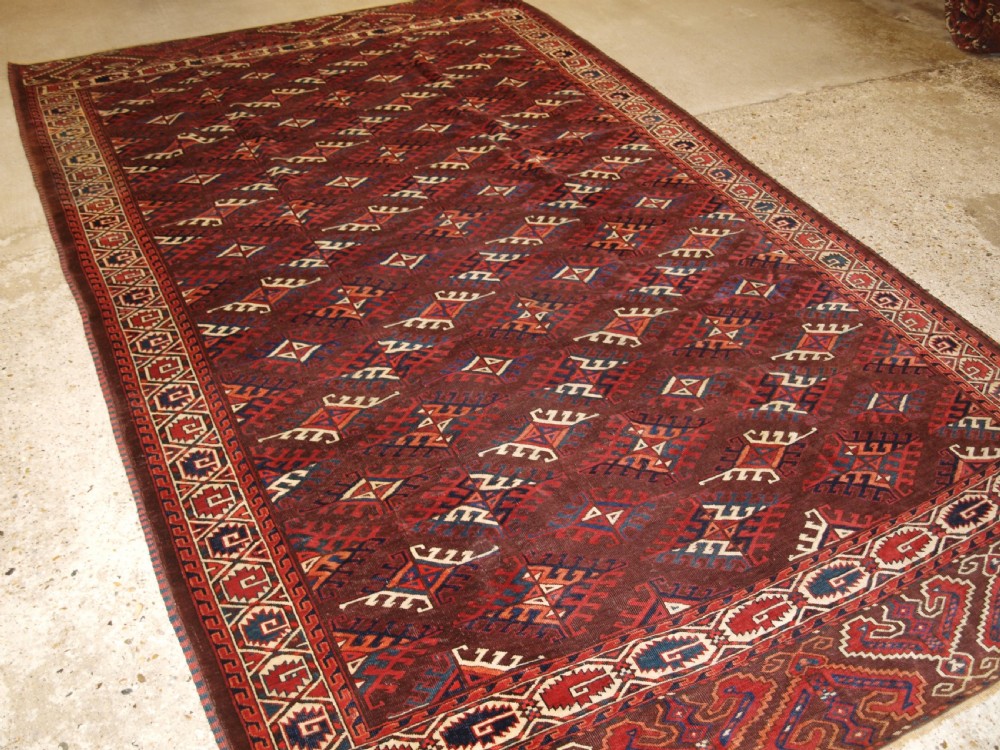 ANTIQUE YOMUT TURKMEN CARPET WITH DYRNAK GUL DESIGN, CIRCA 1890.