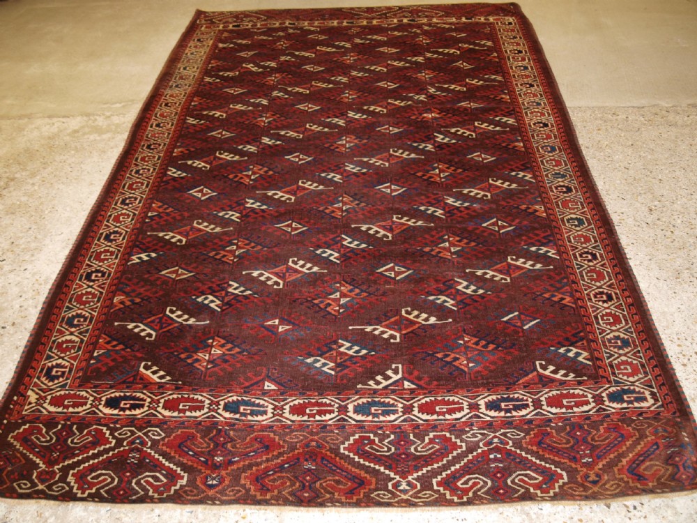 ANTIQUE YOMUT TURKMEN CARPET WITH DYRNAK GUL DESIGN, CIRCA 1890. View III