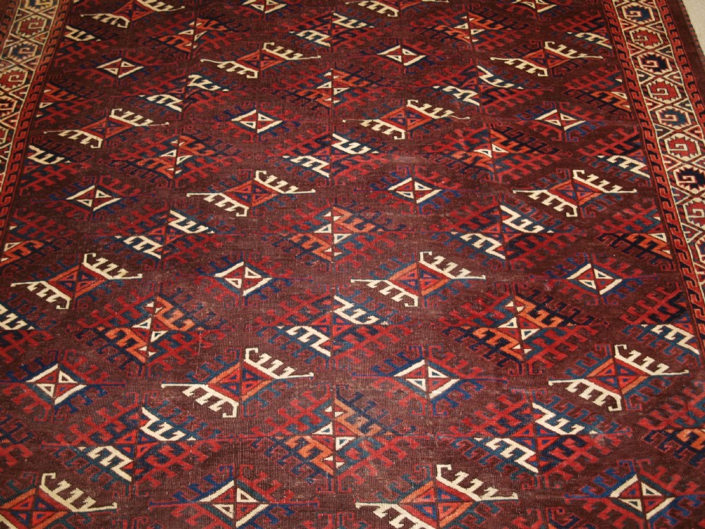 ANTIQUE YOMUT TURKMEN CARPET WITH DYRNAK GUL DESIGN, CIRCA 1890. View VI