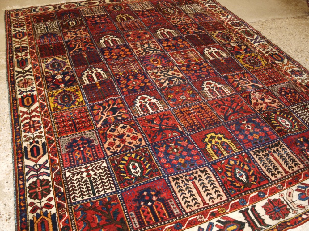 ANTIQUE BAKHTIARI CARPET OF GARDEN DESIGN, CIRCA 1900/20. View II