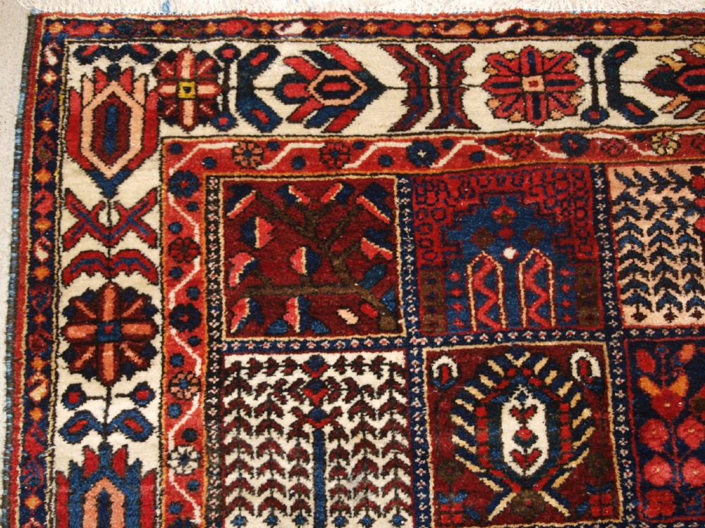 ANTIQUE BAKHTIARI CARPET OF GARDEN DESIGN, CIRCA 1900/20. View III