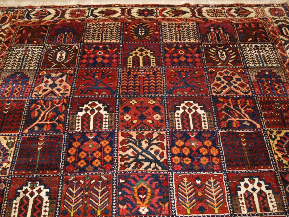 ANTIQUE BAKHTIARI CARPET OF GARDEN DESIGN, CIRCA 1900/20. View IV