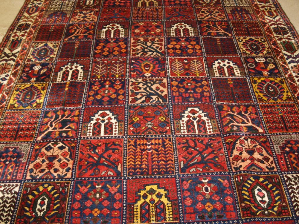 ANTIQUE BAKHTIARI CARPET OF GARDEN DESIGN, CIRCA 1900/20. View V