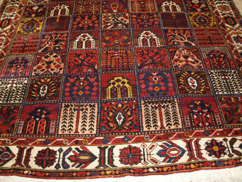 ANTIQUE BAKHTIARI CARPET OF GARDEN DESIGN, CIRCA 1900/20. View VI