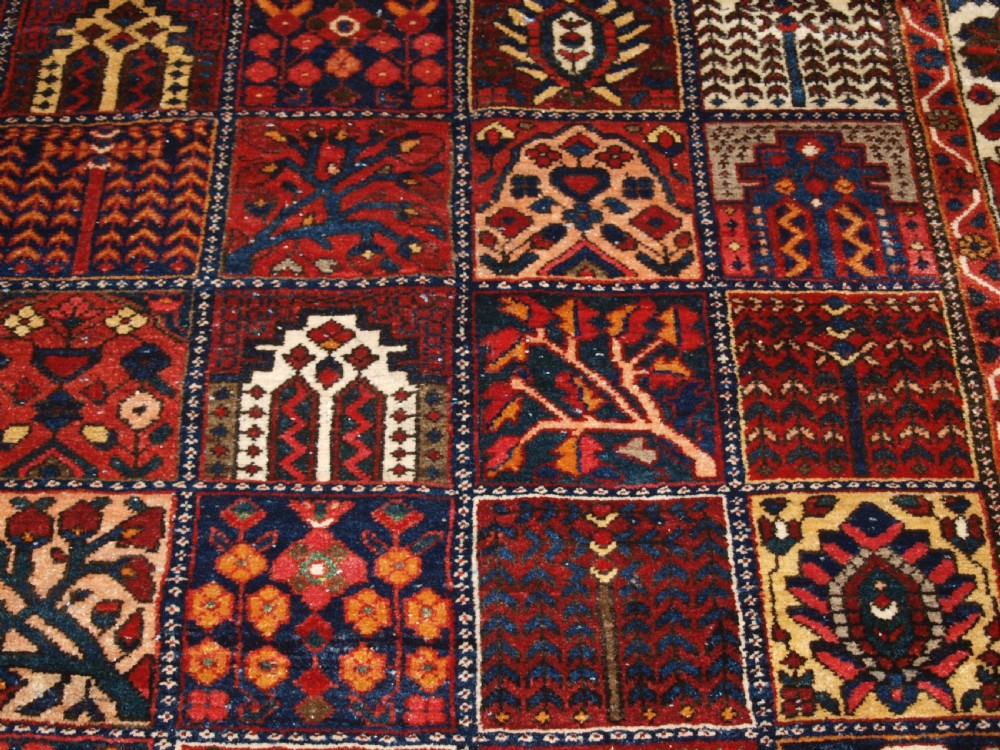 ANTIQUE BAKHTIARI CARPET OF GARDEN DESIGN, CIRCA 1900/20. View VIII