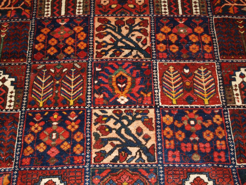 ANTIQUE BAKHTIARI CARPET OF GARDEN DESIGN, CIRCA 1900/20. View IX