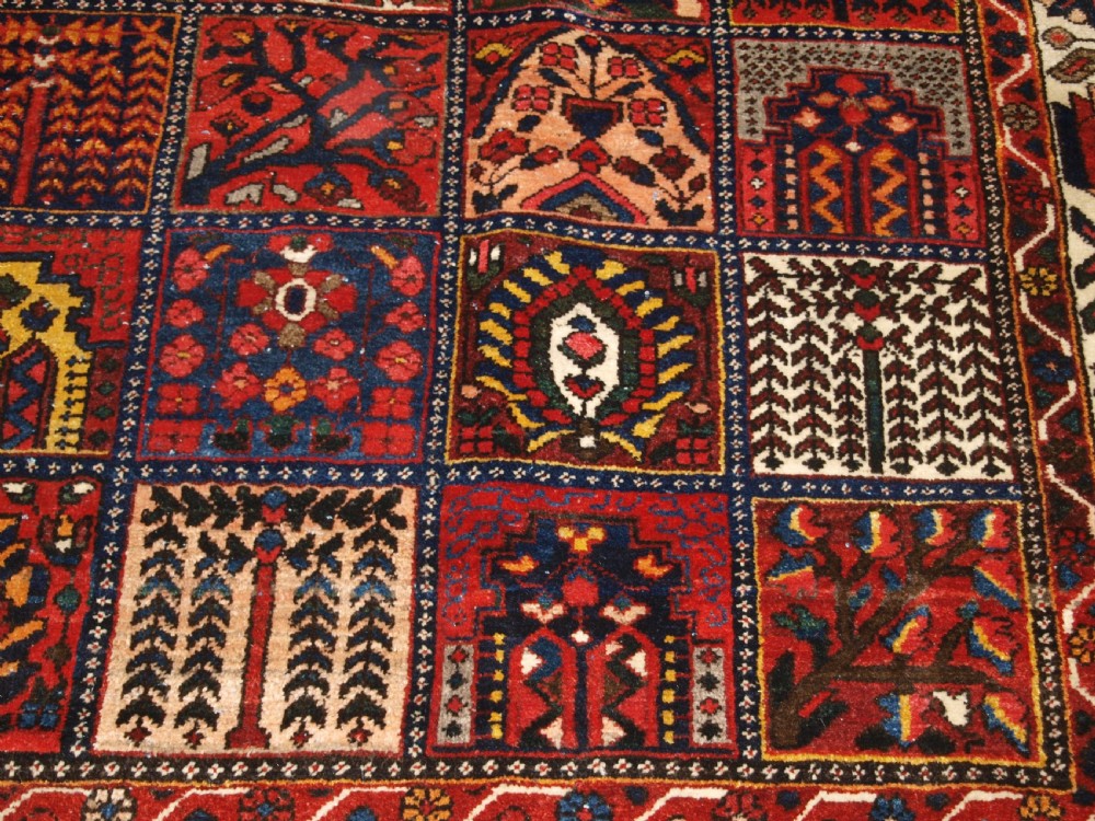 ANTIQUE BAKHTIARI CARPET OF GARDEN DESIGN, CIRCA 1900/20. View X