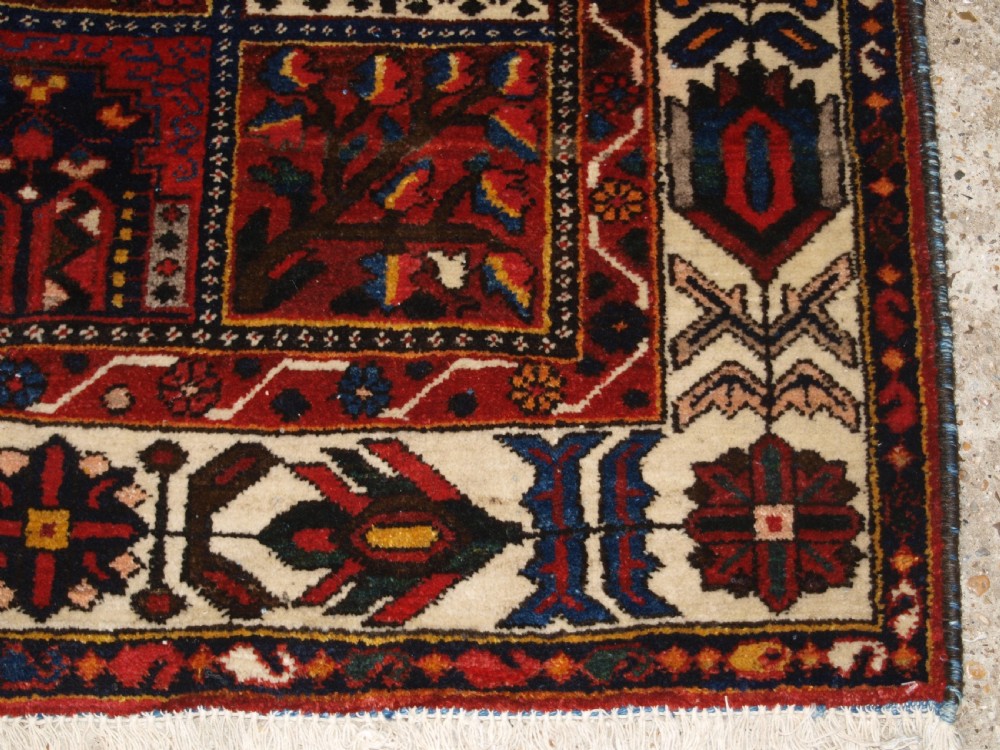 ANTIQUE BAKHTIARI CARPET OF GARDEN DESIGN, CIRCA 1900/20. View XII