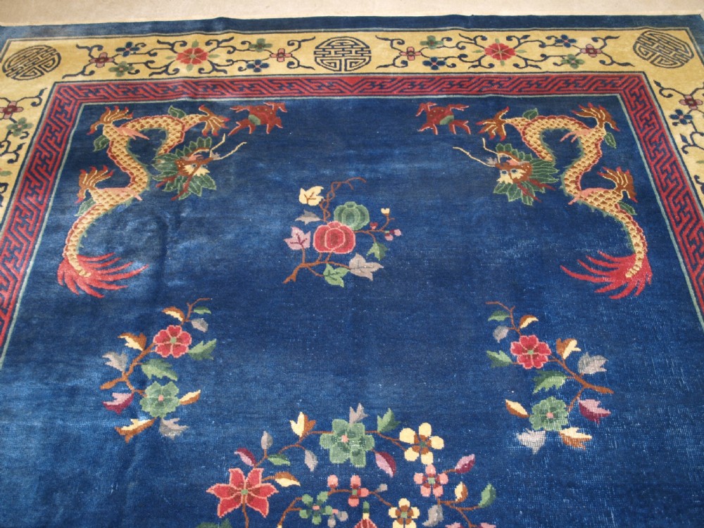 ANTIQUE CHINESE PEKING CARPET WITH FOUR DRAGONS, CIRCA 1920. View III