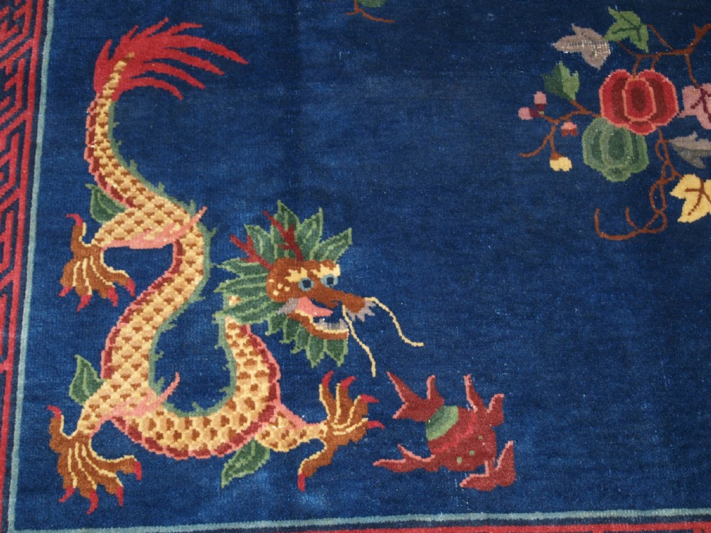 ANTIQUE CHINESE PEKING CARPET WITH FOUR DRAGONS, CIRCA 1920. View X
