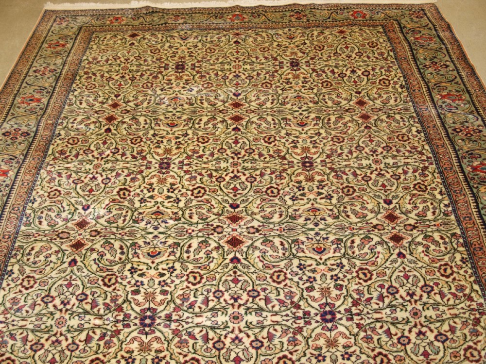OLD TURKISH KAYSERI CARPET, SOFT COLOUR, PALE GREEN BORDER, CIRCA 1930. View IV