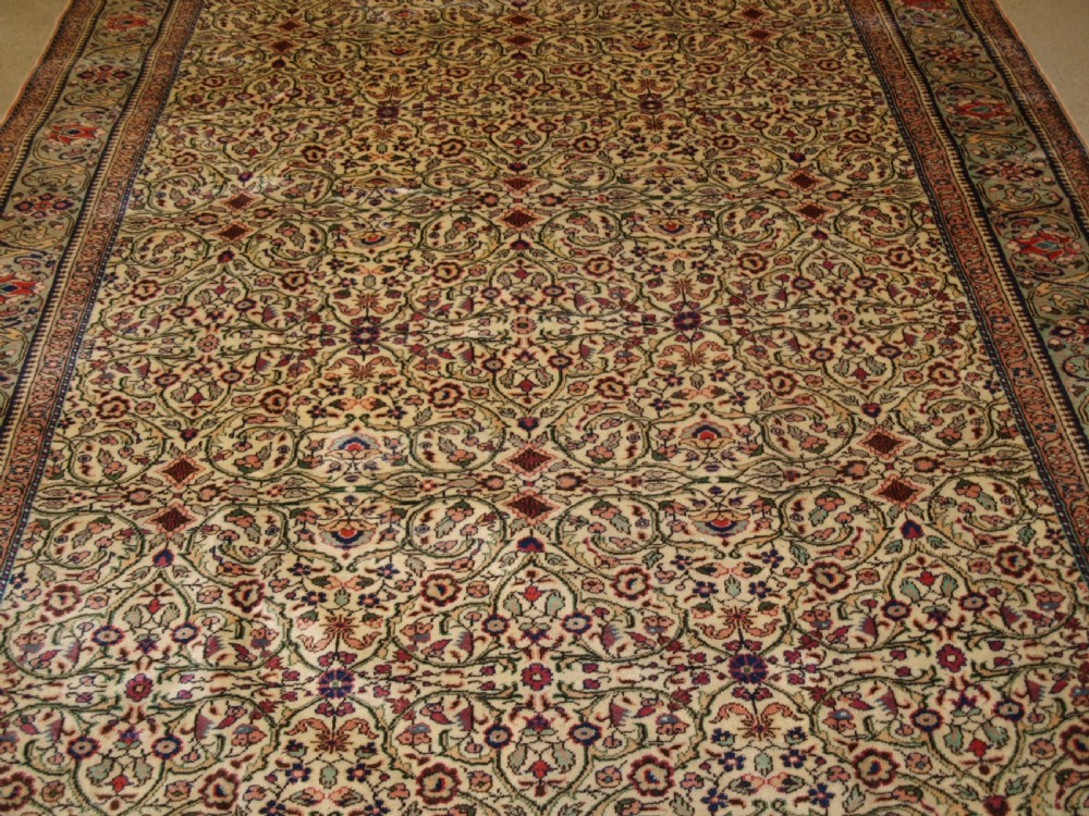 OLD TURKISH KAYSERI CARPET, SOFT COLOUR, PALE GREEN BORDER, CIRCA 1930. View V