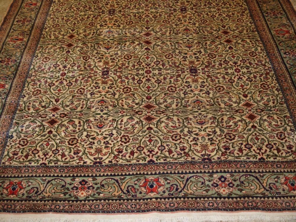 OLD TURKISH KAYSERI CARPET, SOFT COLOUR, PALE GREEN BORDER, CIRCA 1930. View VI