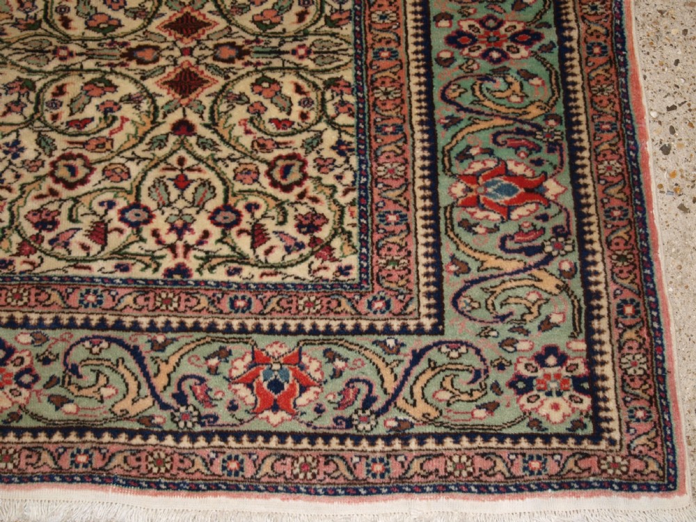 OLD TURKISH KAYSERI CARPET, SOFT COLOUR, PALE GREEN BORDER, CIRCA 1930. View VIII