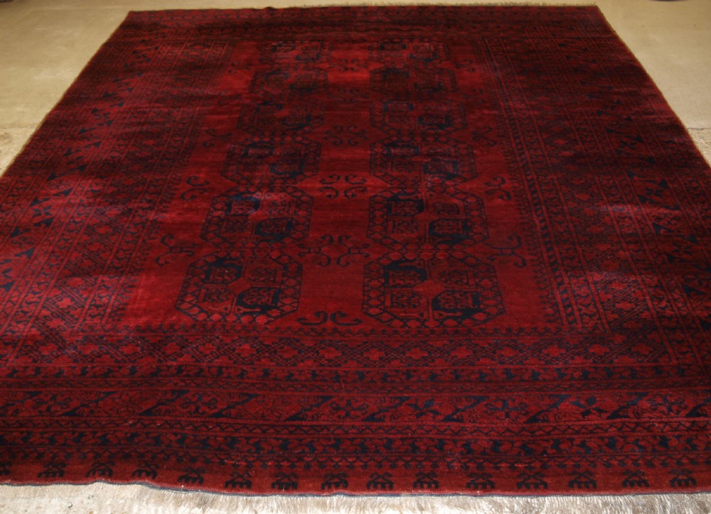 OLD AFGHAN ERSARI VILLAGE CARPET, RICH DEEP RED COLOUR, CIRCA 1920. View II