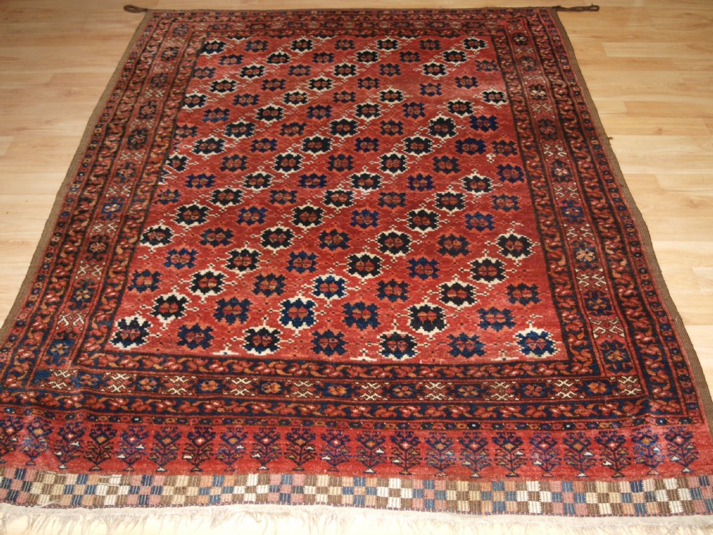 ANTIQUE AFGHAN ENSI DOOR HANGING, POSSIBLY BESHIR TURKMEN, CIRCA 1900.