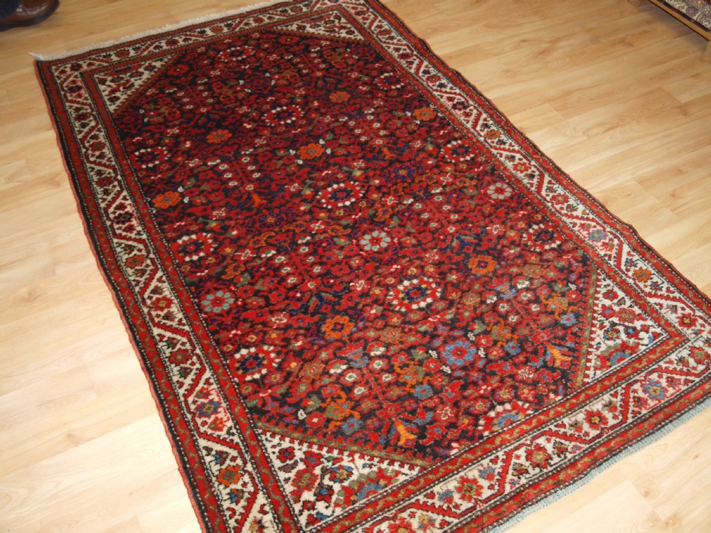 ANTIQUE MALAYER VILLAGE RUG , FLORAL SHRUB DESIGN, CIRCA 1920. View II