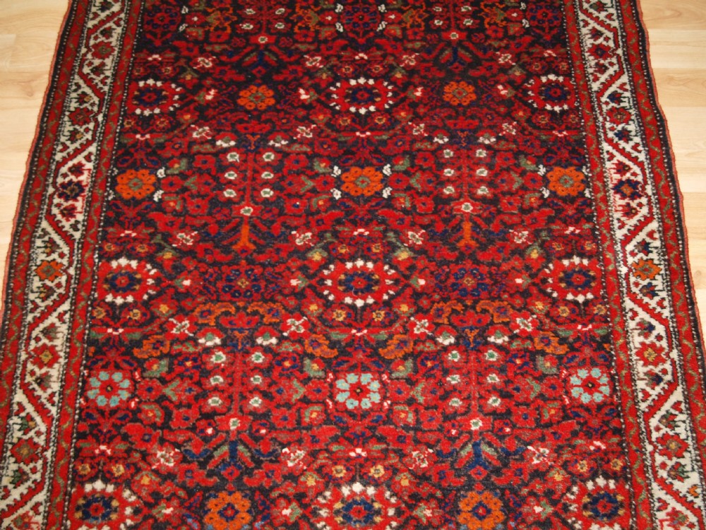 ANTIQUE MALAYER VILLAGE RUG , FLORAL SHRUB DESIGN, CIRCA 1920. View V