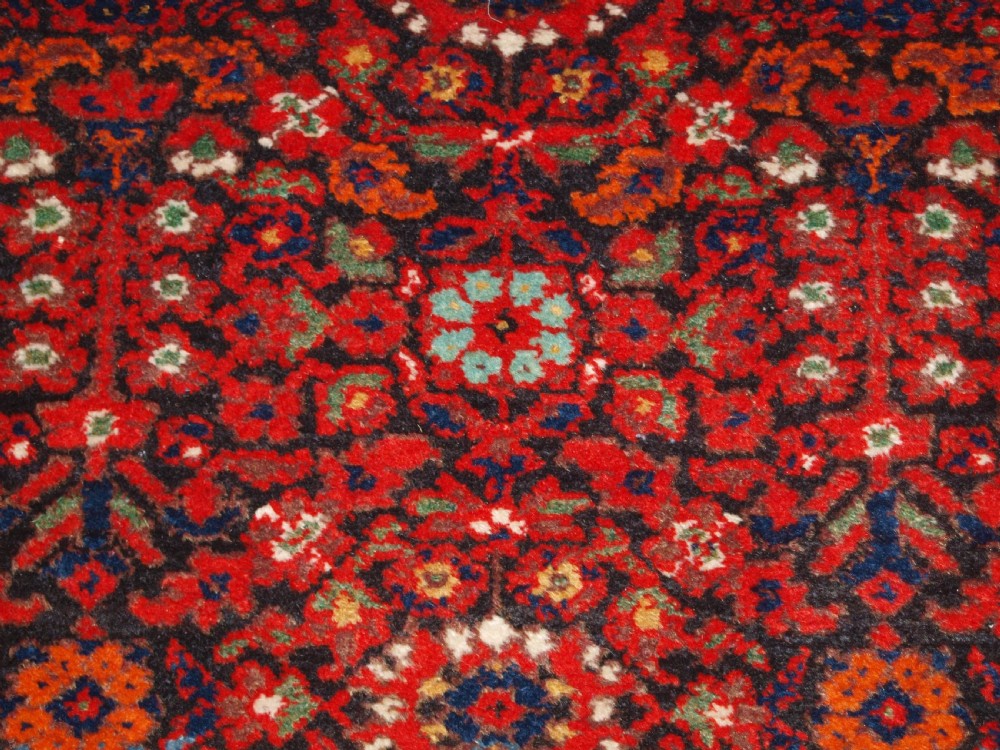 ANTIQUE MALAYER VILLAGE RUG , FLORAL SHRUB DESIGN, CIRCA 1920. View VIII