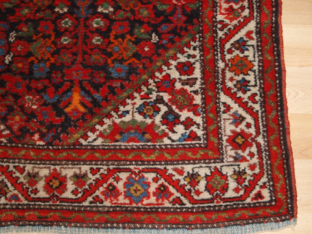 ANTIQUE MALAYER VILLAGE RUG , FLORAL SHRUB DESIGN, CIRCA 1920. View IX