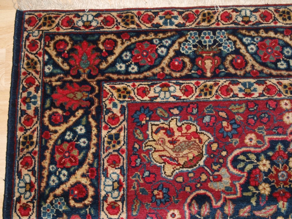ANTIQUE TABRIZ RUG OF FLORAL VASE PRAYER DESIGN, ONE OF A PAIR, CIRCA 1920. View II
