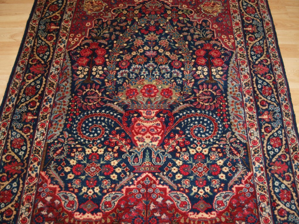 ANTIQUE TABRIZ RUG OF FLORAL VASE PRAYER DESIGN, ONE OF A PAIR, CIRCA 1920. View IV