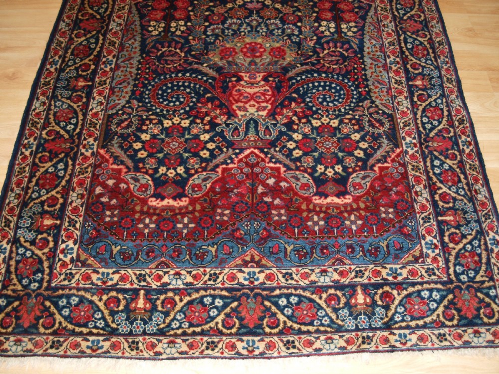 ANTIQUE TABRIZ RUG OF FLORAL VASE PRAYER DESIGN, ONE OF A PAIR, CIRCA 1920. View V