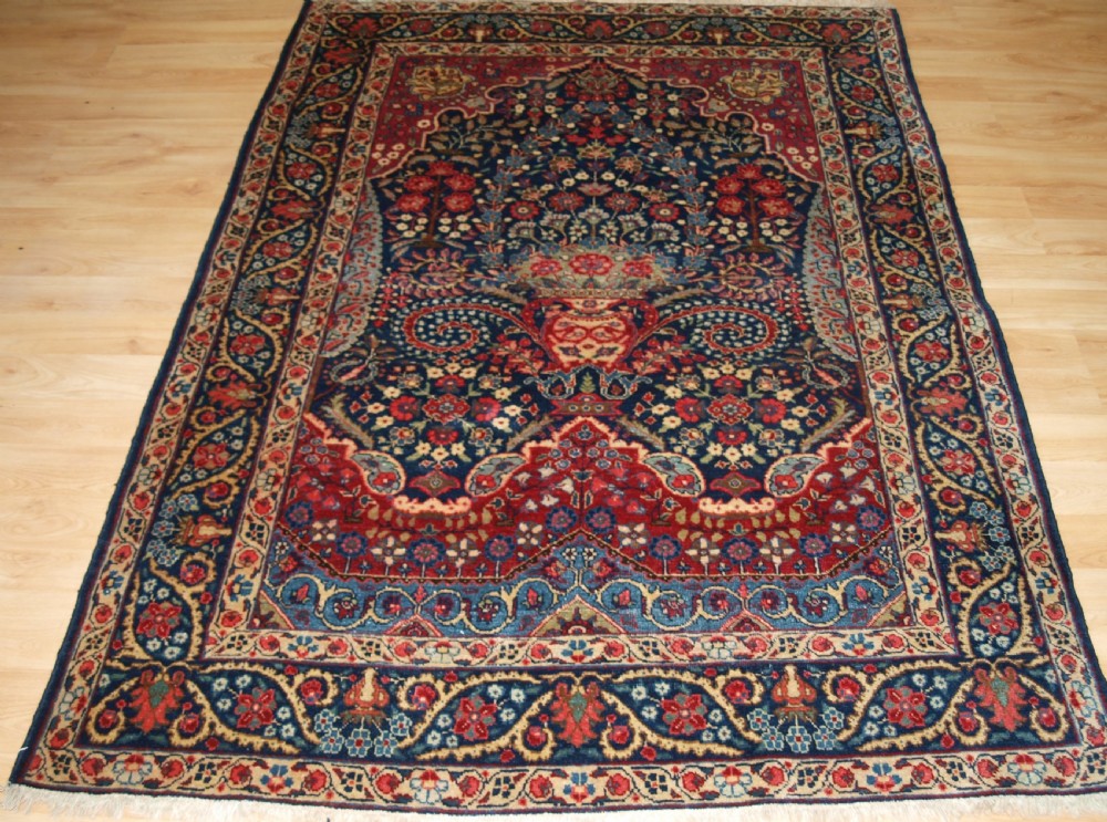 ANTIQUE TABRIZ PRAYER RUG OF FLORAL VASE DESIGN, CIRCA 1920.