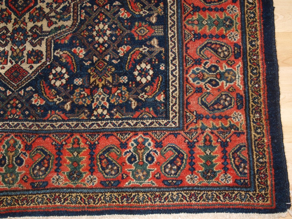 ANTIQUE MALAYER VILLAGE RUG, SOFT RED BORDER, CIRCA 1920. View X
