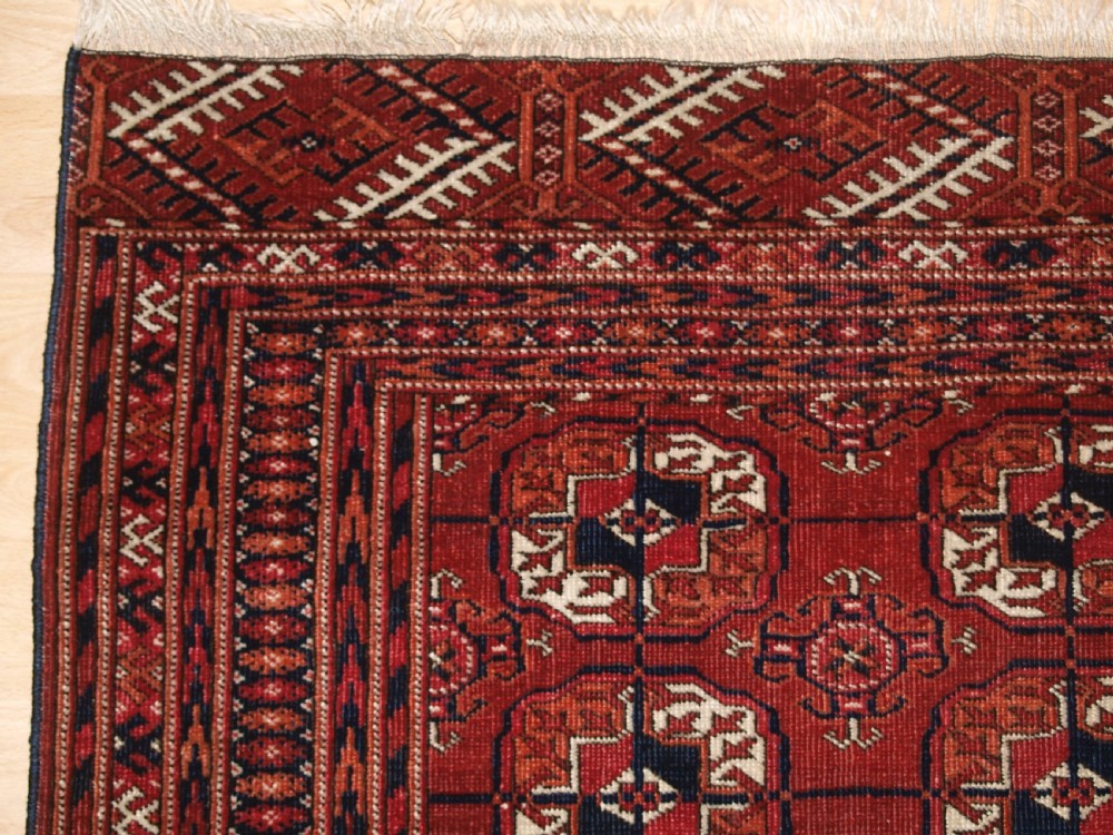 ANTIQUE TEKKE TURKMEN RUG, SMALL SIZE AND GOOD COLOUR, CIRCA 1900. View III