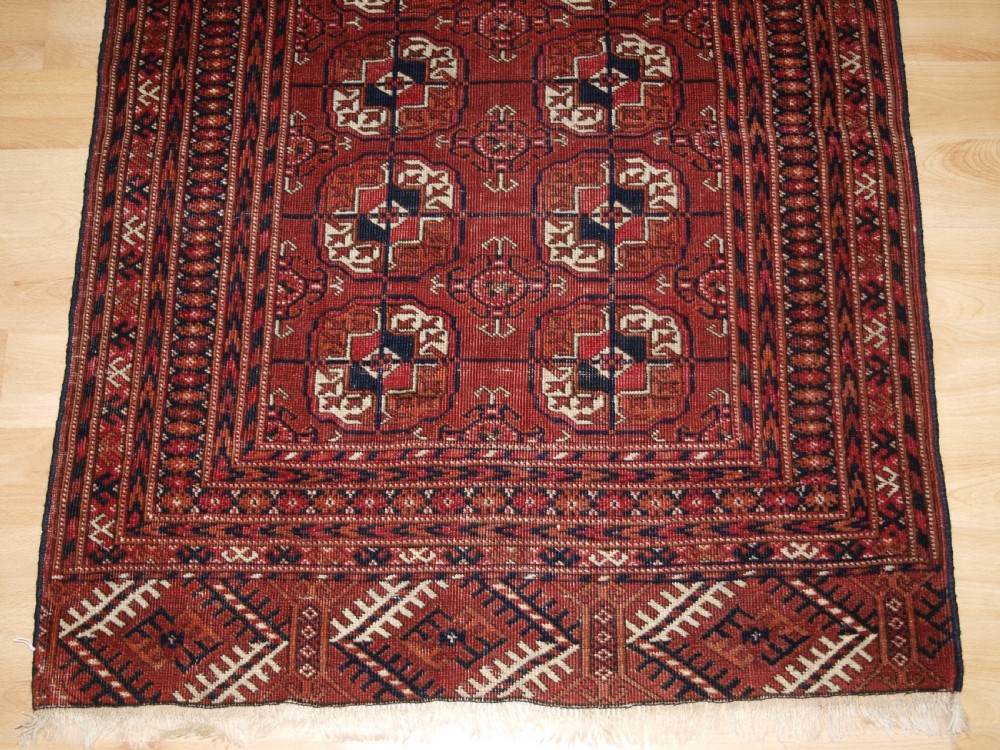 ANTIQUE TEKKE TURKMEN RUG, SMALL SIZE AND GOOD COLOUR, CIRCA 1900. View V