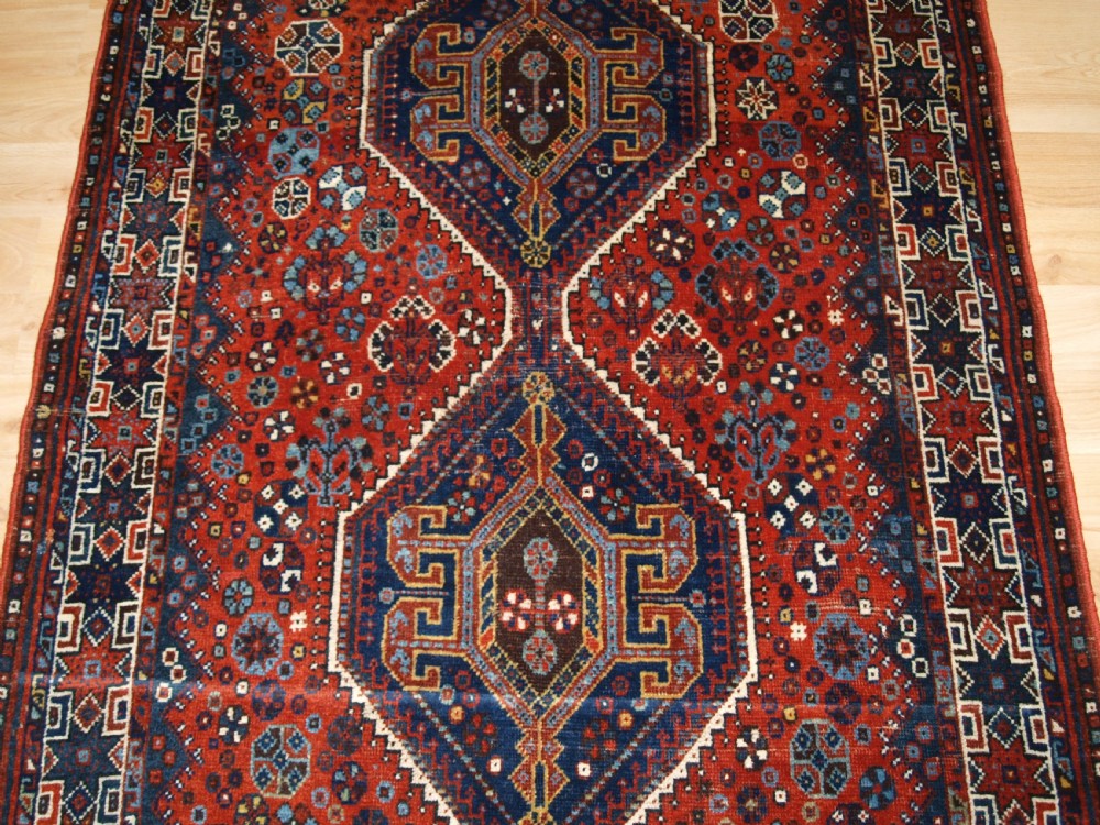OLD KHAMSEH SHIRAZ RUG, CIRCA 1920. View IV