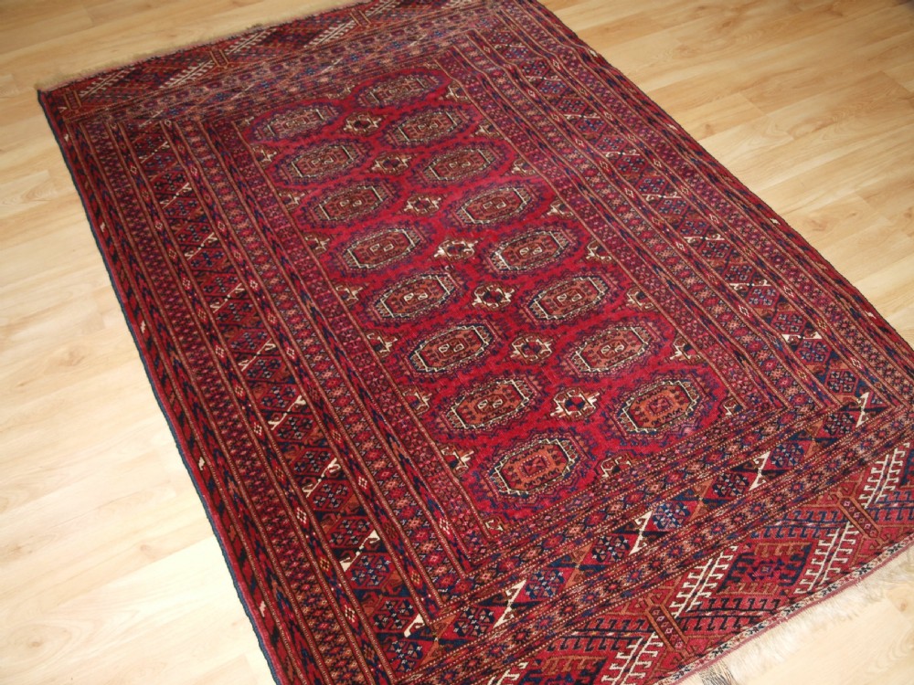 ANTIQUE TEKKE TURKMEN RUG WITH SALOR GULS, CIRCA 1900. View II