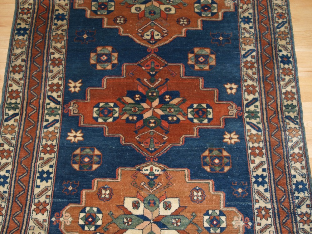 ANTIQUE CAUCASIAN DERBENT TRIPLE MEDALLION RUG, CIRCA 1900. View V