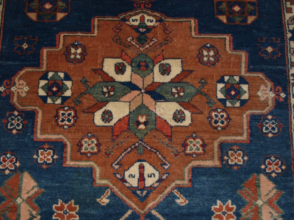 ANTIQUE CAUCASIAN DERBENT TRIPLE MEDALLION RUG, CIRCA 1900. View VIII
