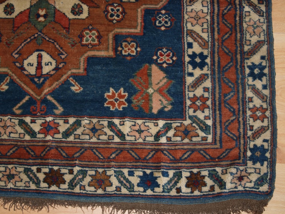 ANTIQUE CAUCASIAN DERBENT TRIPLE MEDALLION RUG, CIRCA 1900. View IX