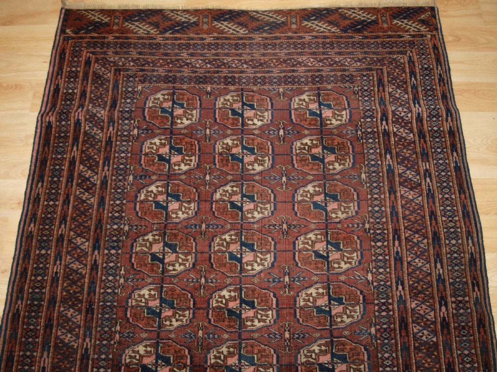ANTIQUE TEKKE TURKMEN RUG, SOFT COLOUR, LIVED WITH LOOK, CIRCA 1900. View III