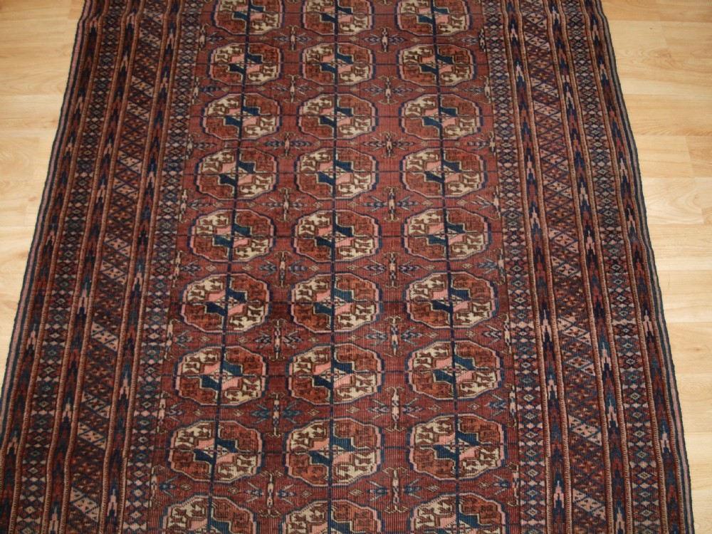 ANTIQUE TEKKE TURKMEN RUG, SOFT COLOUR, LIVED WITH LOOK, CIRCA 1900. View IV