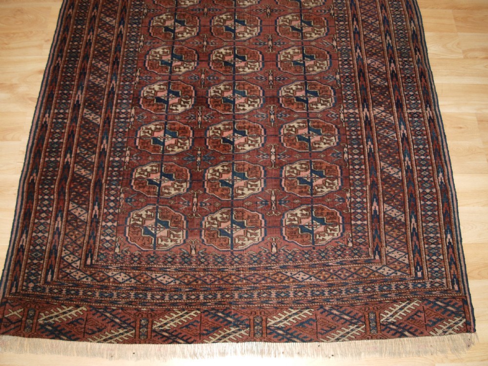 ANTIQUE TEKKE TURKMEN RUG, SOFT COLOUR, LIVED WITH LOOK, CIRCA 1900. View V