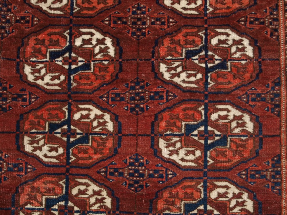 ANTIQUE TEKKE TURKMEN RUG, SMALL SIZE, RED / BROWN COLOUR, CIRCA 1900. View V