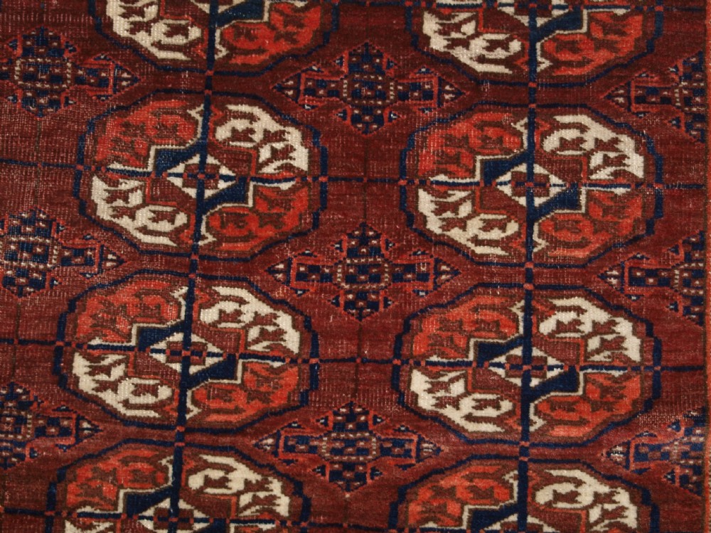 ANTIQUE TEKKE TURKMEN RUG, SMALL SIZE, RED / BROWN COLOUR, CIRCA 1900. View VI